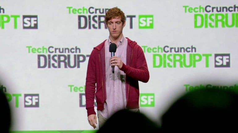 A scene from HBO's SiliconValley where the main character pitches at TechCrunch Disrupt