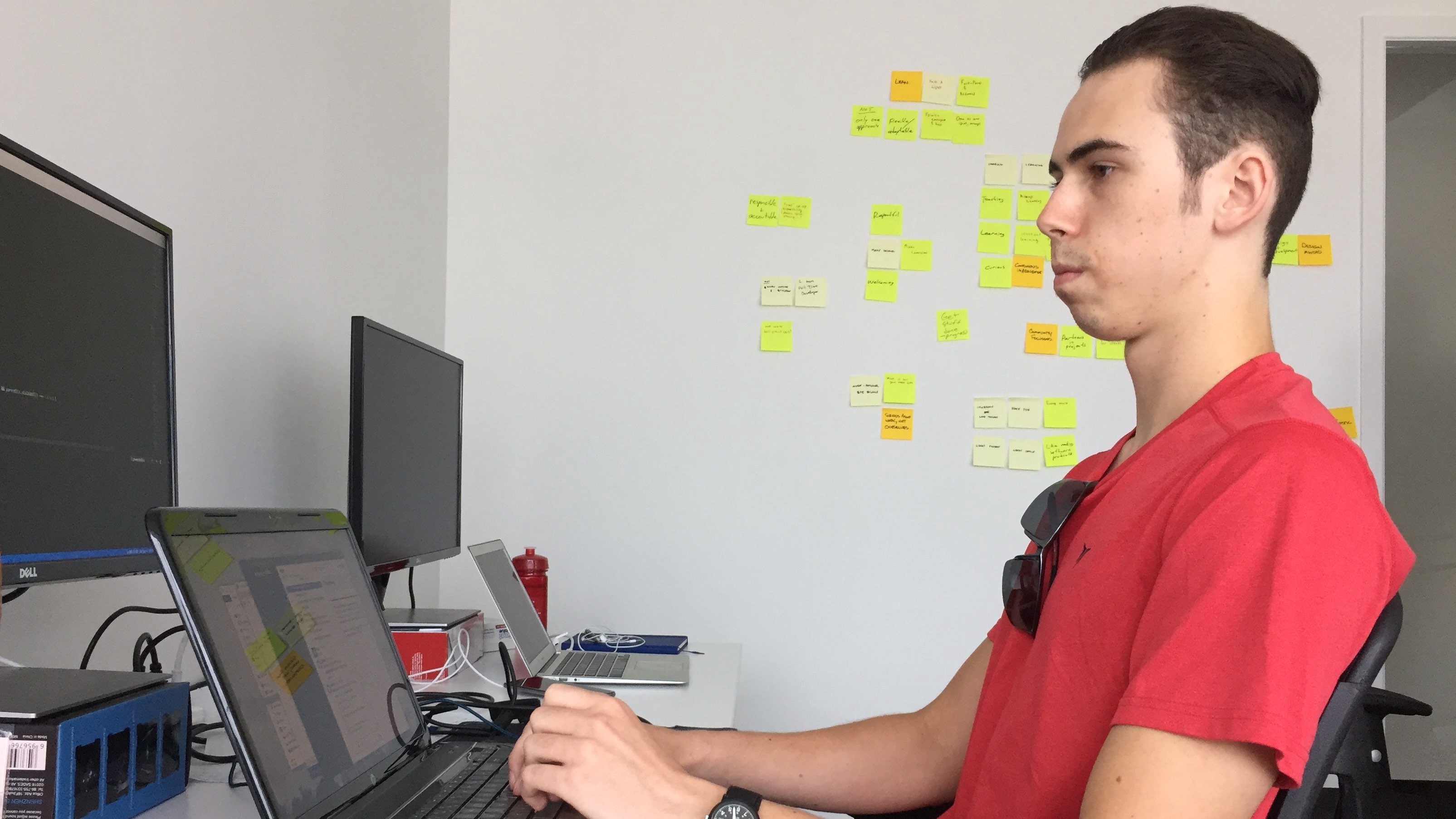 Dmitry Kobets working at his computer in the Zeitspace Kitchener office