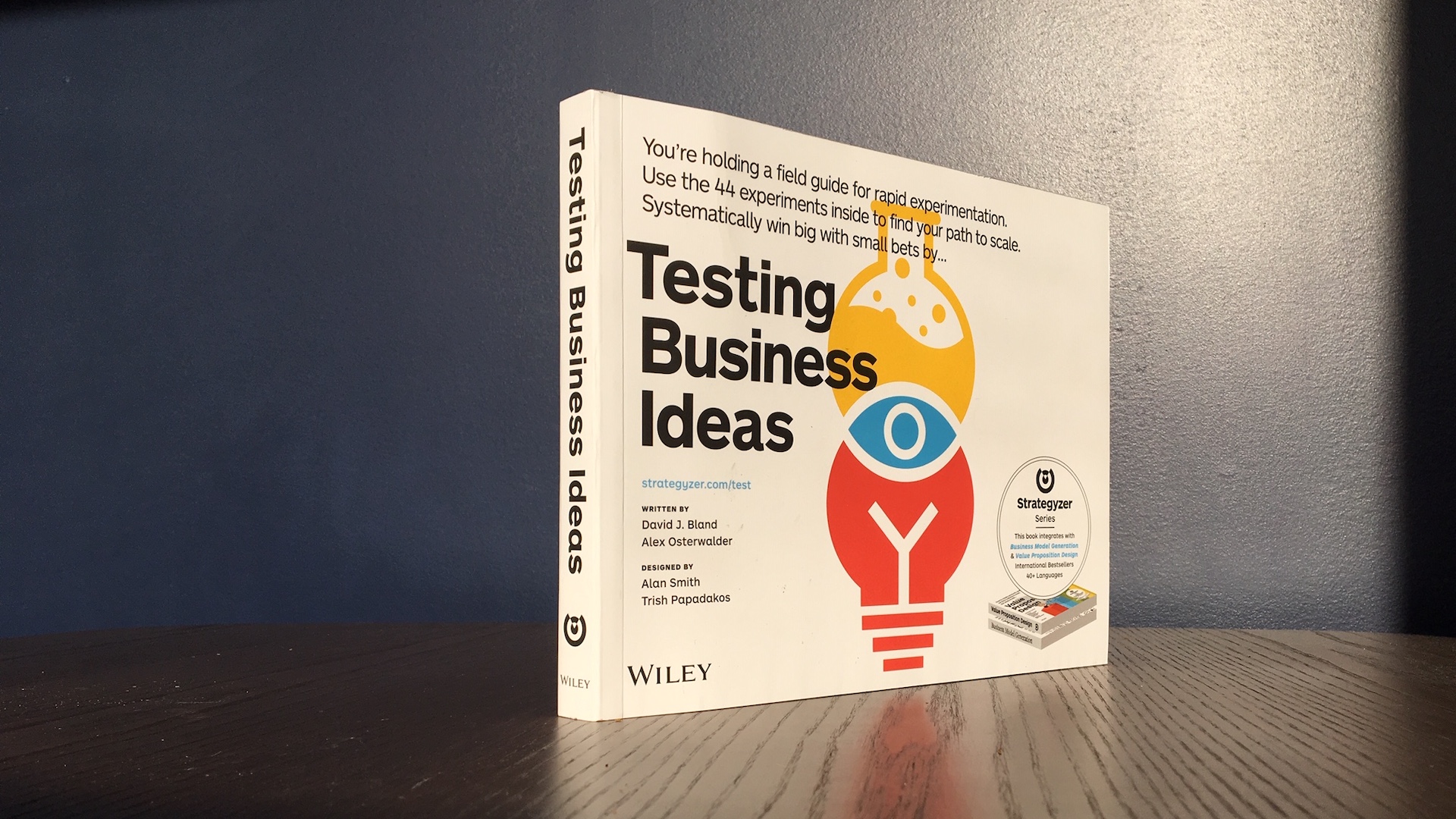 A book entitled Testing Business Ideas is placed upright on a table in a room at the Zeitspace office.